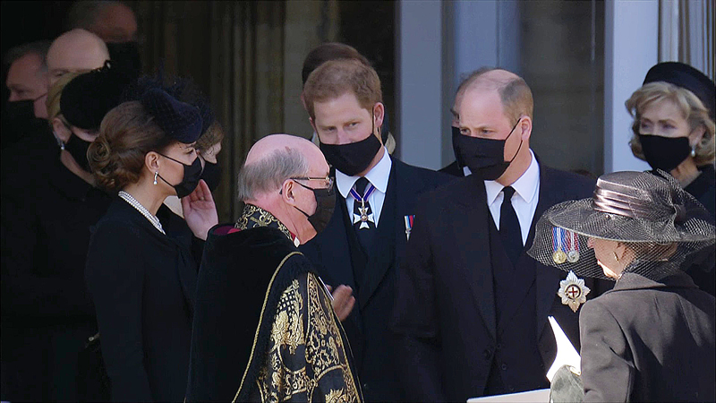 Prince Harry talks with family