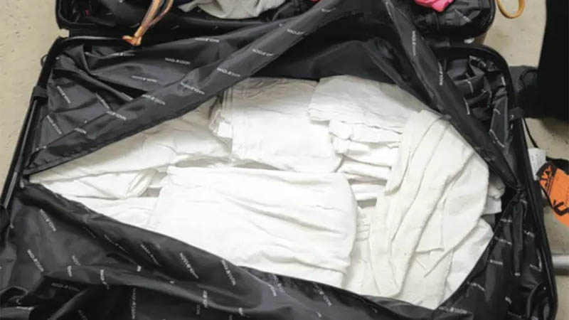 Woman Smuggling Meth-Soaked T-Shirts